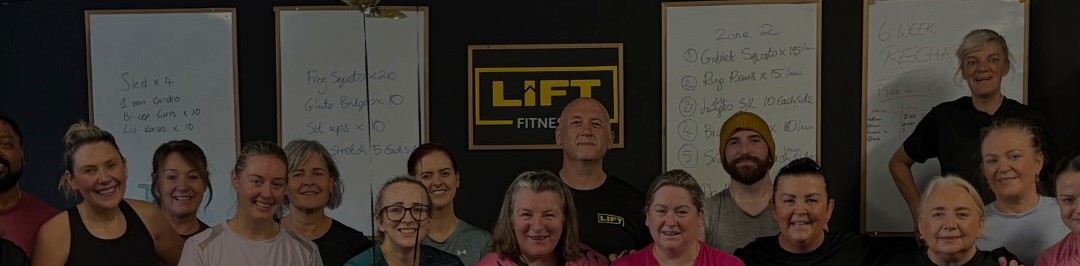 A large group of LIFT members and coaches together in the studio